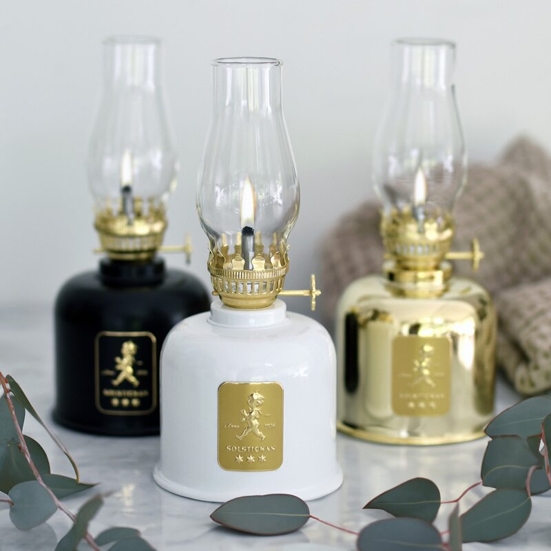 SOLSTICKAN Oljelampa 20 cm vit/guld