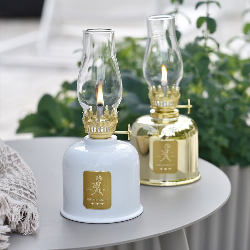 SOLSTICKAN Oljelampa 20 cm vit/guld