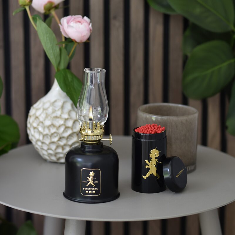 SOLSTICKAN Oljelampa 20 cm svart/guld